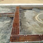 Airport apron trench drain system